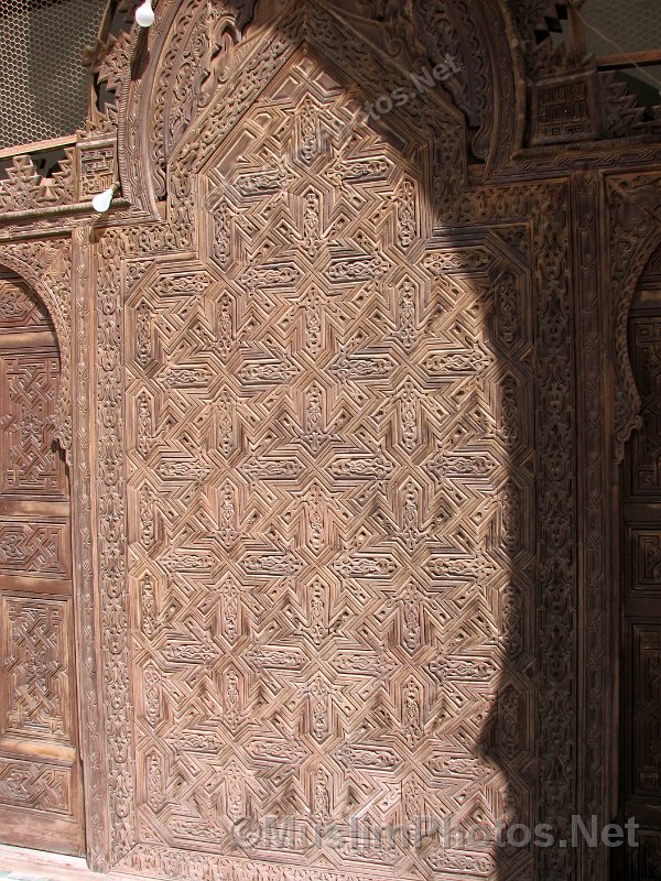 Wooden door with beautiful carving within the Ben Youssef Mosque